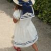 Konges Sløjd Konges Sløjd Allie Sailor Jurk Gots Optic White 5715681060544 SS25 Konges Kleding & Accessoires Rokjes & Jurkjes  Wijs west