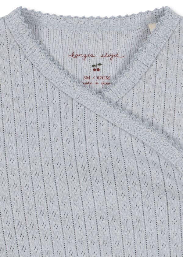 Konges Sløjd Konges Sløjd Minnie Newborn Body Gots Gray Dawn 5715681122525 Konges AW25 Kleding & Accessoires Baby Rompers Wijs west