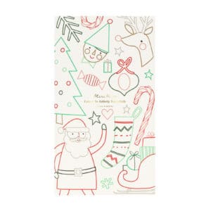 Kerst inkleur tafelkleed van Meri Meri uitgerold over een feesttafel