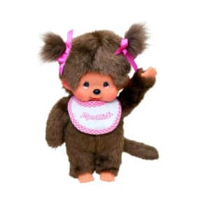 Bruine Monchhichi met roze strikjes in twee staartjes en een wit-roze slab – zwaaiend